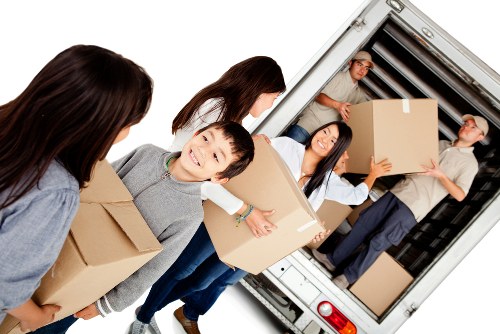 Removal truck loading at a Manandvan Stockwell residence